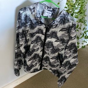 Sunrise Kingdom size small zip up hooded wind breaker with awesome floral print.